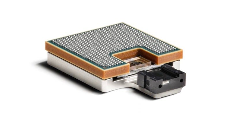 the Waveguide Lids and Polymer Optical Waveguide Are Integrated with a Chip.